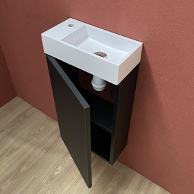 petit meuble lave mains 36 x 18 cm avec le caisson mélaminé noir mat et la vasque blanche